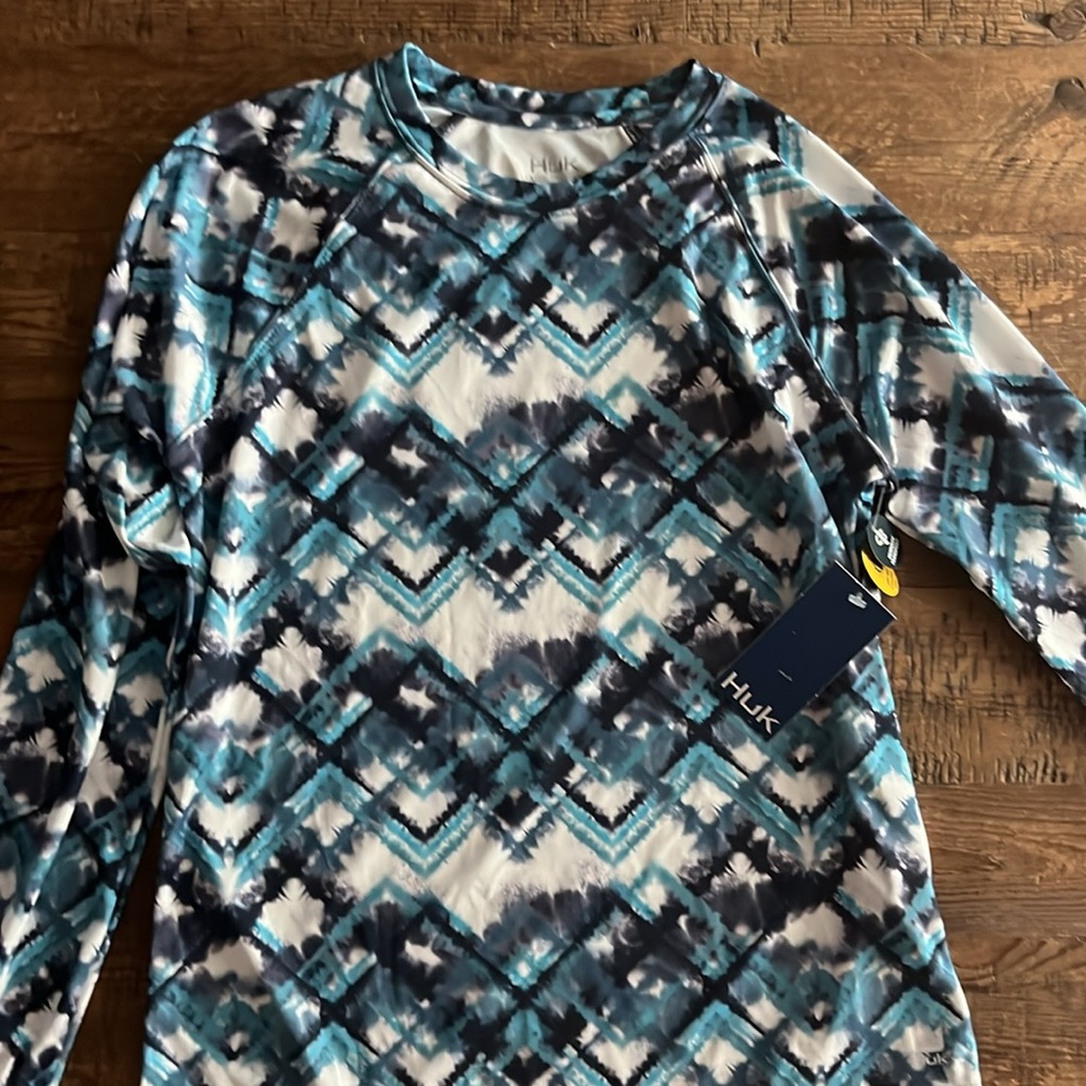 HUK Sun guard or wet suit top for women